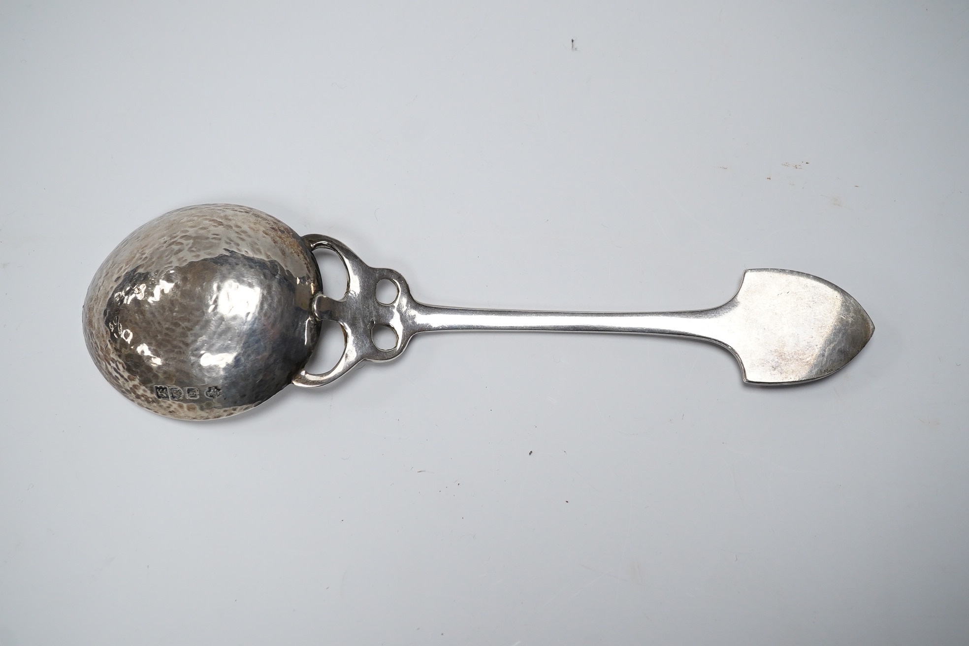 An Edwardian Art Nouveau Kate Harris for William Hutton & Sons silver and enamel spoon, the terminal lacking stone?, London, 1903, 18.4cm, gross weight 63 grams. Condition - poor